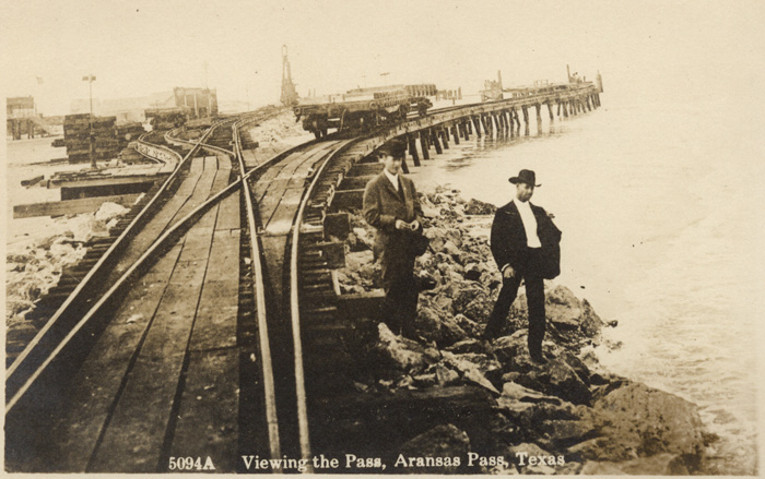 Aransas Harbor Terminal Ry. flat car and pile driver in construction work on the south jetty at Aransas Pass, Texas, ca. 1909. 