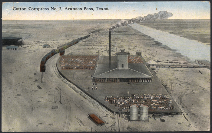 Aerial view of Aransas Pass Compress Company's compress no. 2 and Aransas Harbor Terminal Ry. industrial tracks. Aransas Pass, Texas, ca. 1915. 