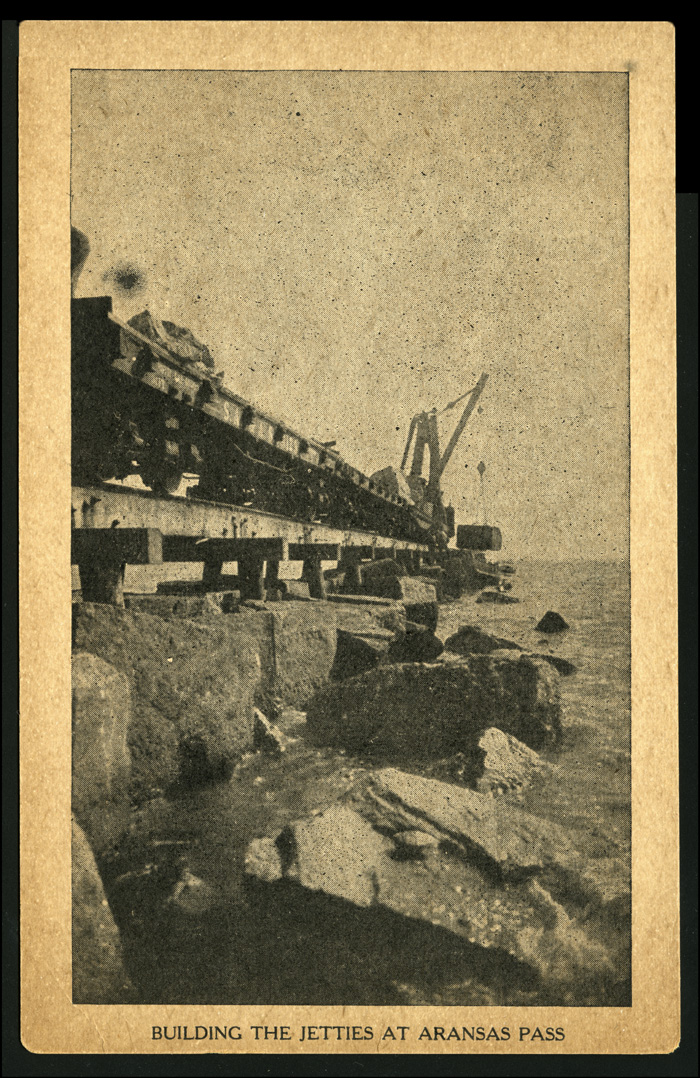Aransas Harbor Terminal Ry. train in construction work on the north jetty at Aransas Pass, Texas, ca. 1909. 