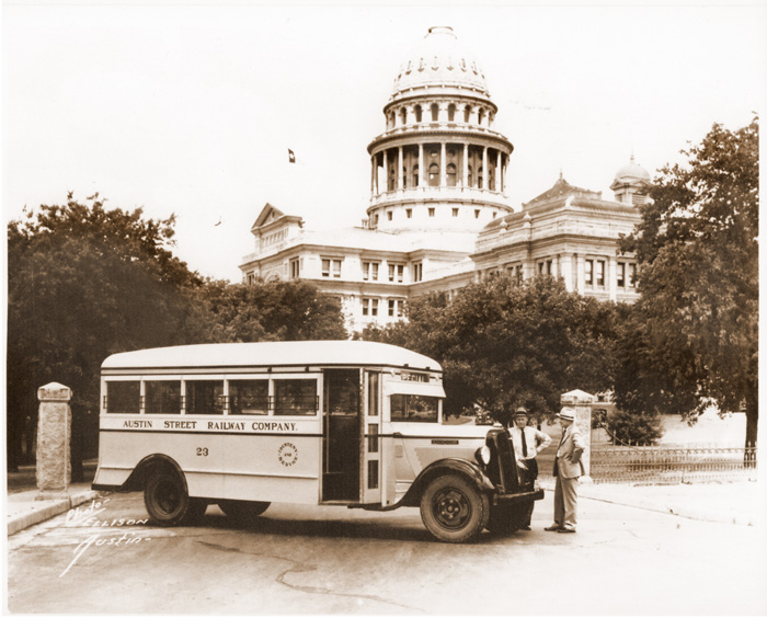 Austin Street Ry. public bus posing in front of the Texas capitol building in May 1961. 